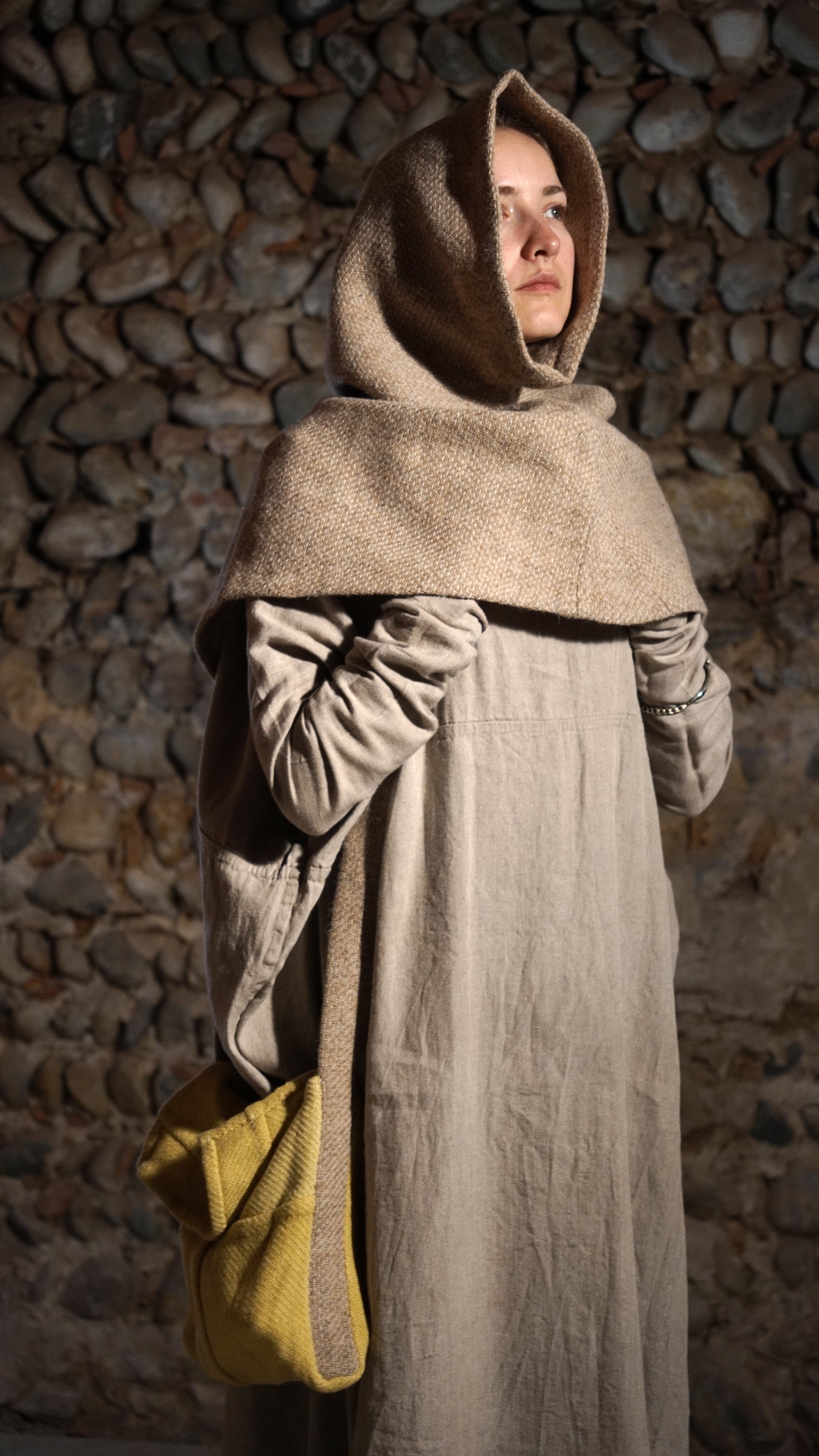 Woman wearing Greenland hood and a bag